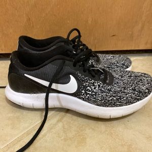 Nike Flex Contact Tennis shoes.